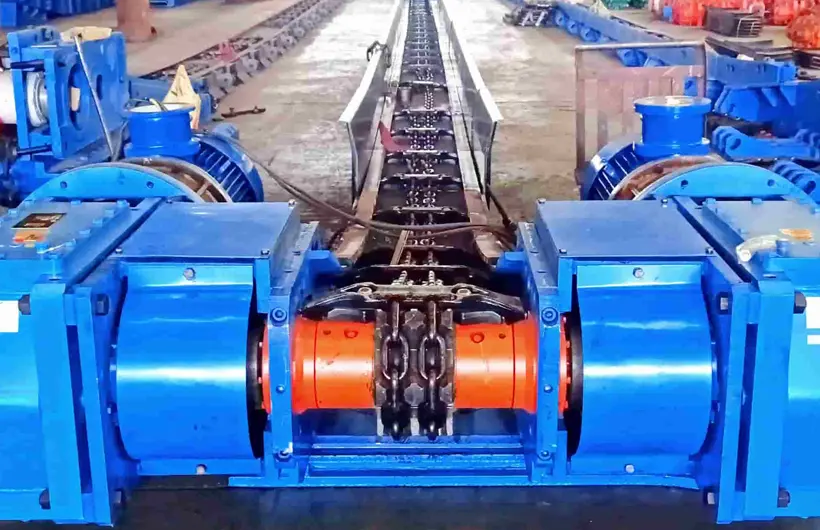 Transportador de raspadores
